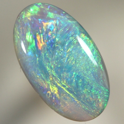 SOLID SEMI BLACK OPAL Bright sparkling colours moving over turquoise blue 